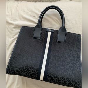 Beautiful large DKNY tote in excellent condition. Been worn only once.
